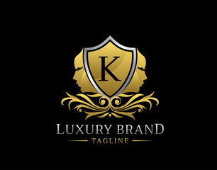 Royal Beauty Logo With K Letter. Elegant Gold Shield badge With Beauty Face Shape perfect for salon, spa, cosmetic, Boutique, Jewelry.