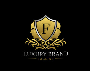 Royal Beauty Logo With F Letter. Elegant Gold Shield badge With Beauty Face Shape perfect for salon, spa, cosmetic, Boutique, Jewelry.