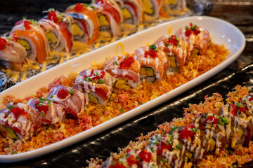 Sushi is delicious on bowl in restaurants. Japanese food concept.