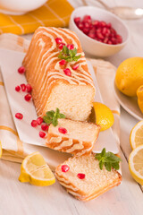 Lemon sponge cake with pomegranate. 
