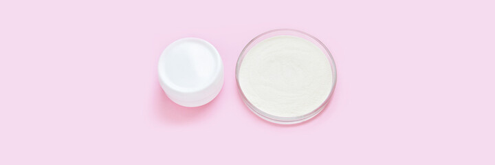 Collagen white powder. Pastel color background. Health product. Woman cosmetics concept. Sport supplement. Skincare cosmetics. Horizontal banner. Cream jar