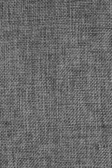 Fototapeta na wymiar Details of grey fabric textile texture background.