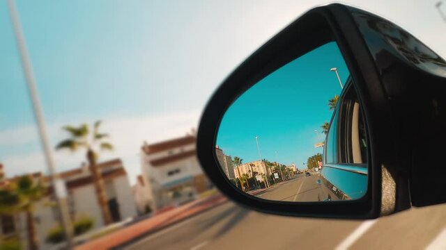 Car side mirror with blurred background
