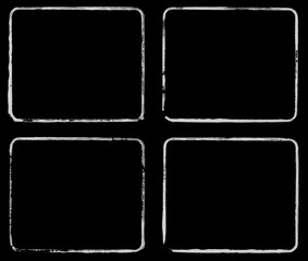 4 leere weiße grunge Rahmen auf schwarzer Farbe