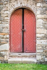 Medieval wooden door in old church