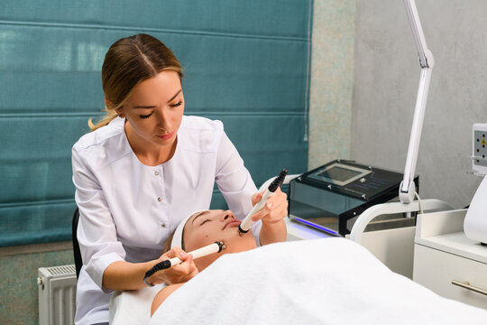 Microcurrent hardware therapy at beauty spa salon