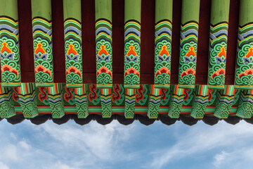 Traditional multicolored paintwork on wooden buildings in korea, Dancheong