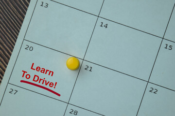 Learn to Drive on monthly Calendar and marked 20th isolated on the table
