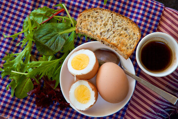 Eggs, toast and coffee for breakfast.