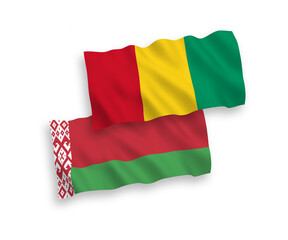 Flags of Guinea and Belarus on a white background