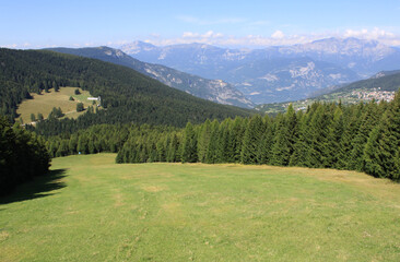beautiful natural landscape of mountains in Folgaria from the chairlift, Italy