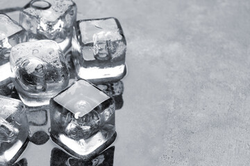 Ice cubes and water drops