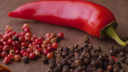 Hot pepper pod and peppercorns