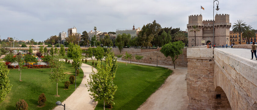 Valencia, Spain: bridge over the former Turia river, now a city park, near the Serranos towers and 