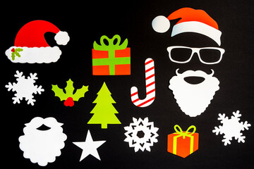 Collection Of Paper Christmas Decoration Like Santa Hat, Gift, Snowflake, Star. Black Background