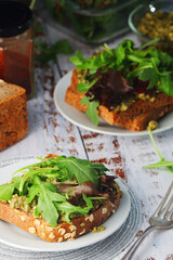 Sandwiches with pesto and green salad	