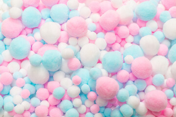 White, pink and blue soft pompons