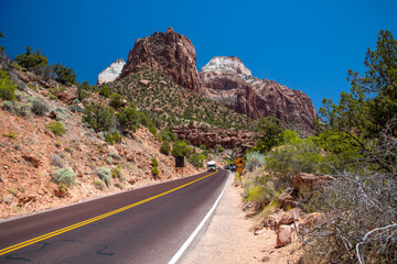 Amazing red road across the Zion National Park in summer season, USA
