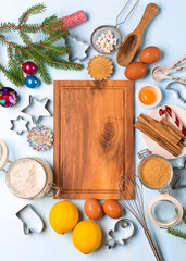 Ingredients for Christmas baking - flour, spices, eggs and cookie cutters.