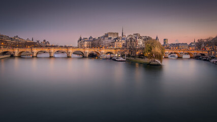 Fototapeta na wymiar sunset over the river Seine and Pont Neuf Paris