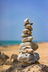 Balanced stones on the beach