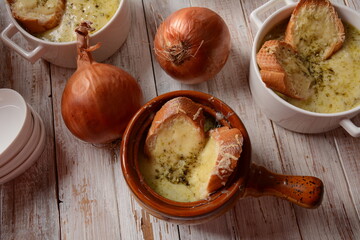 French Onion Soup with toasted bread and cheddar cheese
