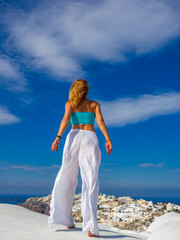 Woman on holidays in Santorini island