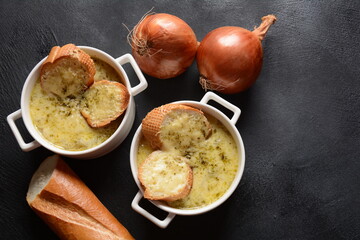 French Onion Soup with toasted bread and cheddar cheese