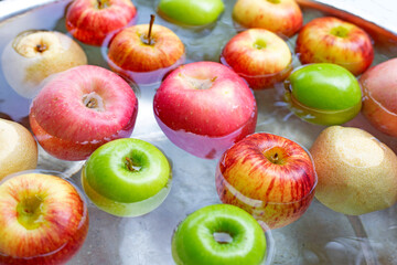 Washing fresh apples in the water