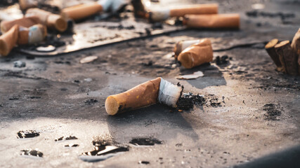 A Cigarette butt discarded after smoking