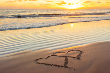 Couple hearts on sea beach. Valentine day and love concept