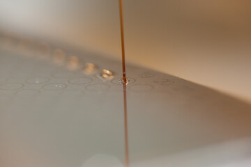 Robotic pipetting in laboratory in biomedicine