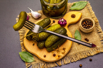 Marinated pickled cucumbers with spices and herbs