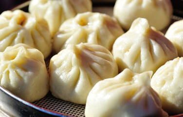 Chinese food steamed buns in a container