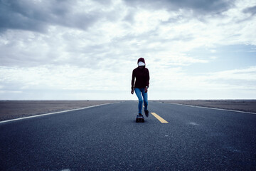 Asian woman skateboarder skateboarding in the wide world © lzf