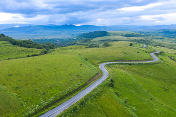 Aerial view of a winding country road winding