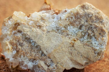Grown translucent small crystals from a block of stone