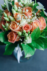 bouquet in the hands of the bride