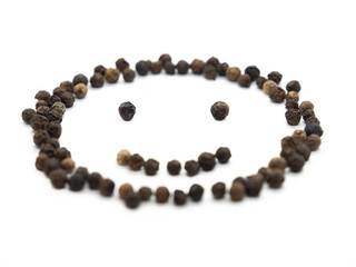 Black pepper emoticon smile. Isolated tasty, background herb, spice,  peppercorn emoticons for social media banner.
