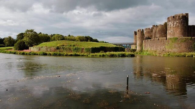 Panoramic shot revealing of Caerphilly Castle in Wales, UK built by Gilbert de Clare in 1268 to  maintain control of Glamorgan
