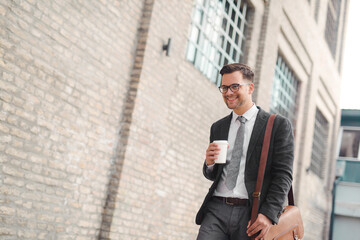 Cheerful businessman going to work