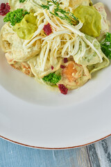 Colorful Ravioli Tortellini With cheese. Colorful Russian pelmeni dumplings.