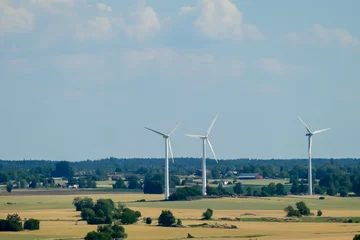 Fotobehang Noord-Europa wind turbine on blue sky, in Sweden Scandinavia North Europe