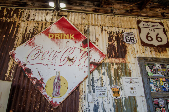 Hackberry, Arizona, USA - February 17, 2020: Vintage drink Coca Cola sign at a historic Route 66 general store on a remote Arizona highway. 