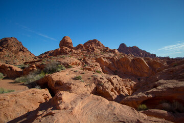 Fototapeta na wymiar Valley of Fire. Red rock mountains and cliffs in the desert of Nevada at Valley of Fire State Park.