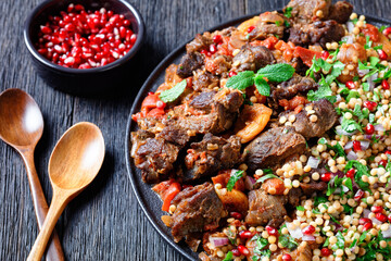 lamb stew with pearl couscous and pomegranate © myviewpoint