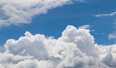 Naklejka na ściany i meble Beautiful blue sky and white clouds background.