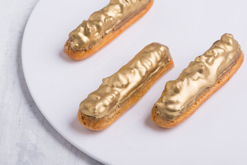 delicious cake with icing on a white plate