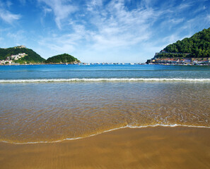 Sand beach and ocean in the bay