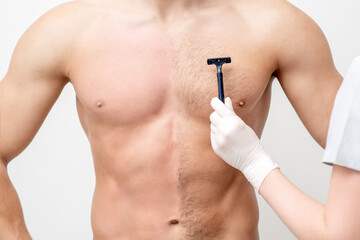 Hand of female beautician shaves chest of young man by razor. Concept of hair removal